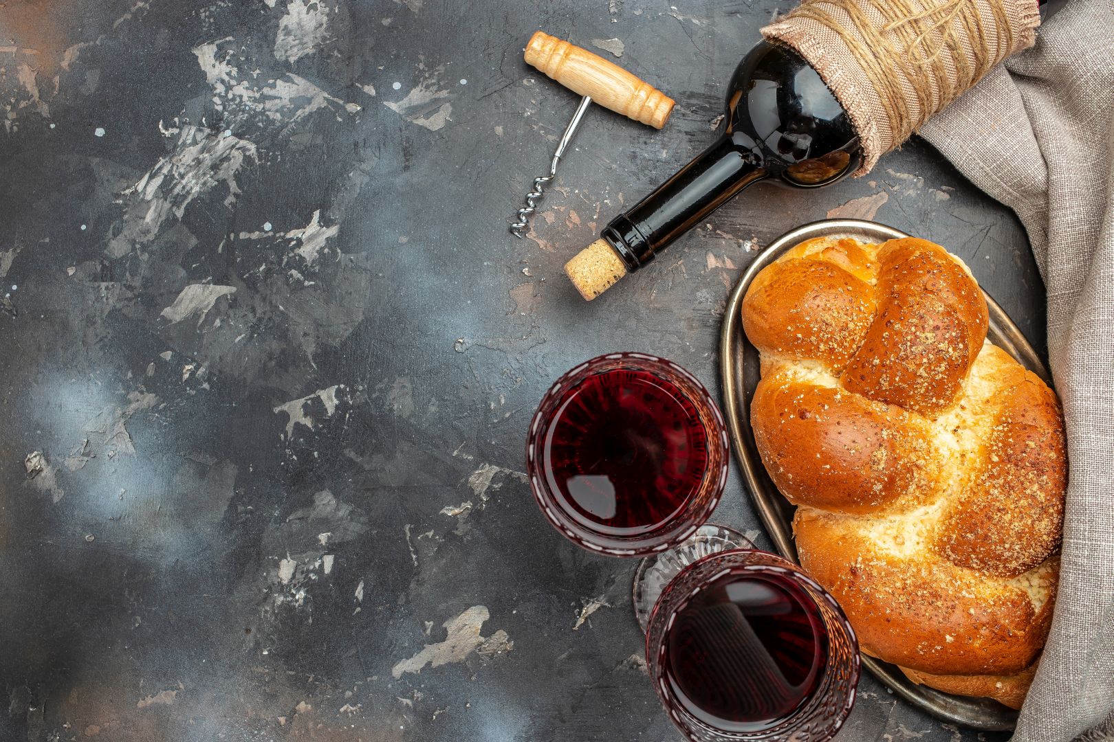 Shabbat Shalom Challah Bread, Shabbat Wine On A Dark Background, Top View